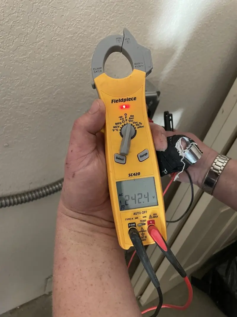 Voltage testing with clamp meter during Circuit Breaker Repair in Winchester